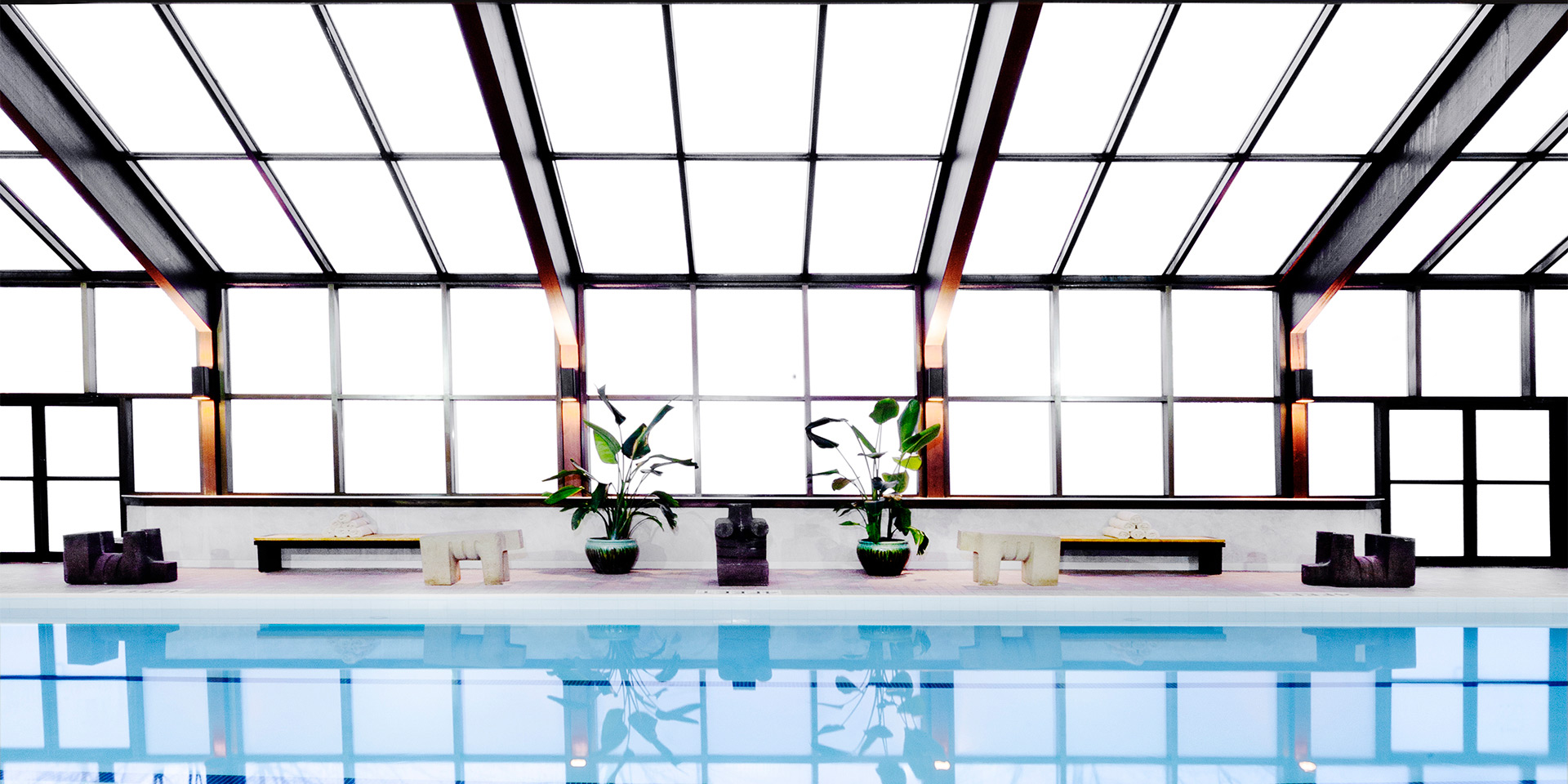 beautiful indoor pool with big windows