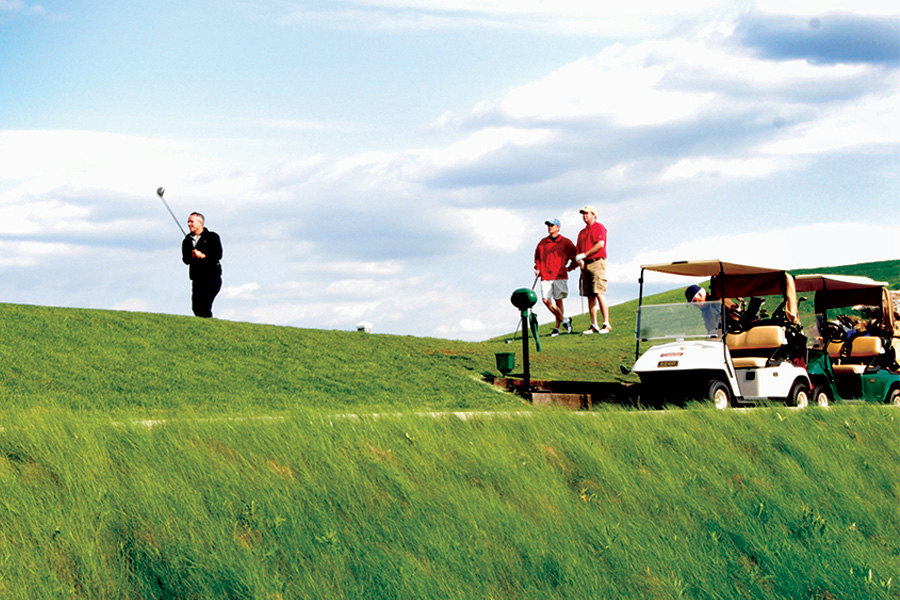 men on a golf course